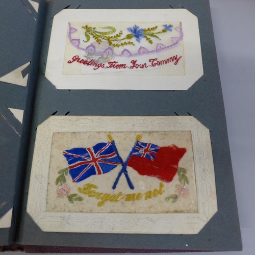 673 - Postcards; two albums of military related postcards, one of silks (26 no.) and one of general items ... 