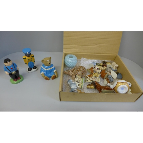 711 - A collection of Wade Whimsies, a Wade Teddy bear, boxed, toy soldier and Buffalo Fair special figure... 