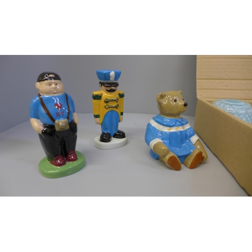 711 - A collection of Wade Whimsies, a Wade Teddy bear, boxed, toy soldier and Buffalo Fair special figure... 