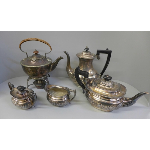 736 - A silver plated tea service and a silver plated teapot with stand and burner