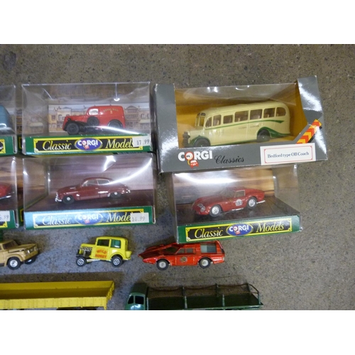 748 - A collection of boxed Corgi classic model vehicles and other playworn model vehicles