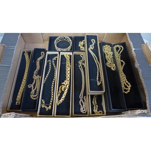 764 - Twenty-one gold tone necklaces and bracelets