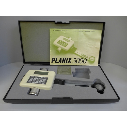 777 - A Planix 5000 Tamaua digitizing area-line meter, tool for measurement of length and area on plans, e... 