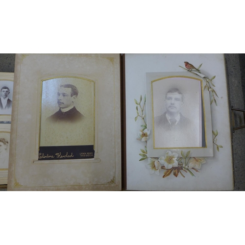 780 - Four Victorian photograph albums containing carte de visites and cabinet cards