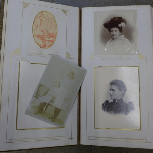 780 - Four Victorian photograph albums containing carte de visites and cabinet cards