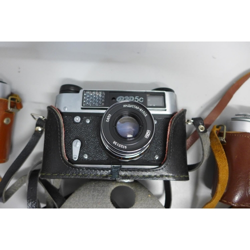 788 - Three Russian 35mm range finder cameras, with cases