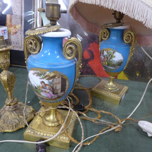 794 - Two pairs of porcelain and gilt metal table lamps and an ormolu table lamp (5)