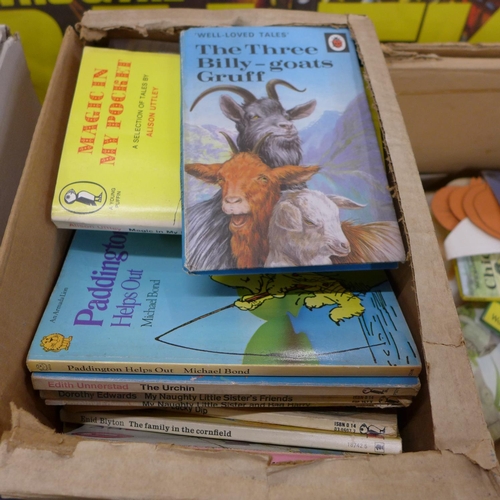 799 - A collection of Ladybird books and other children's books and annuals and a tambourine