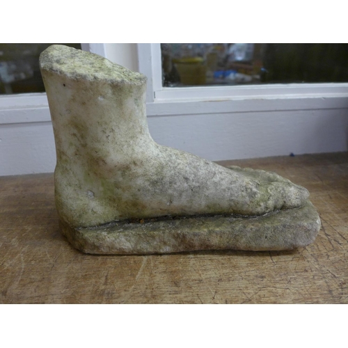 811 - A marble foot, a Romanesque fragment from a large statue