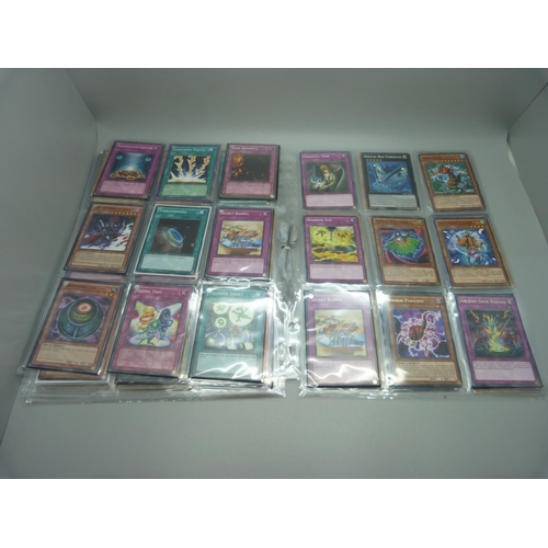 849 - 126 Yu Gi Oh cards including Dragons, Holos and First Editions