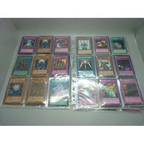 849 - 126 Yu Gi Oh cards including Dragons, Holos and First Editions