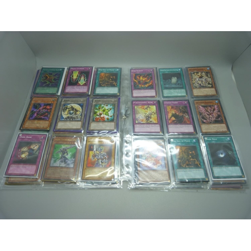 849 - 126 Yu Gi Oh cards including Dragons, Holos and First Editions