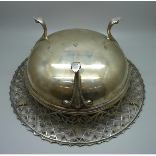 872 - A pierced silver dish with commemorative engraving, 'Presented to Mr M.A. Rushbrook to commemorate t... 