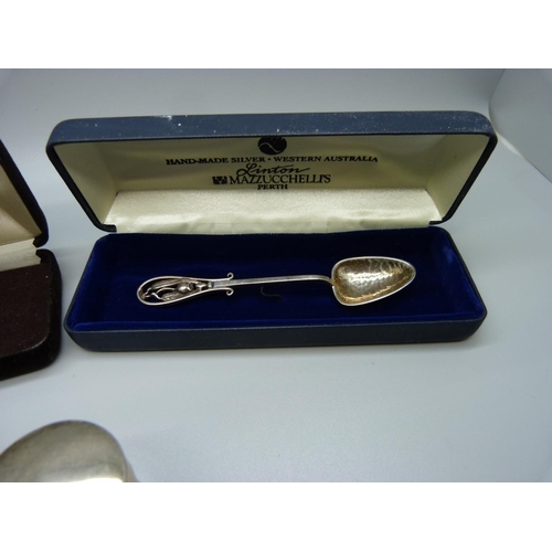 892 - A small Victorian silver pot, a silver napkin ring, a/f and two silver spoons, boxed, 74g