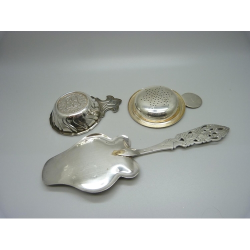 918 - A Spanish silver dish, a strainer marked Christofle and a pastry server