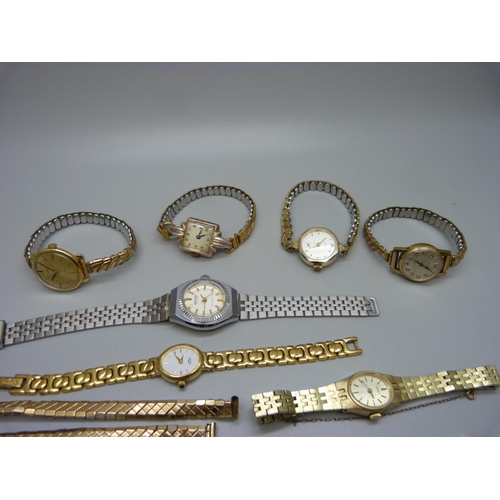 922 - A lady's yellow metal cased IWC wristwatch, 23mm case and other lady's wristwatches