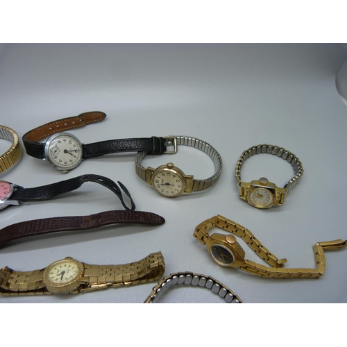 927 - A collection of lady's wristwatches including Omega and Cyma