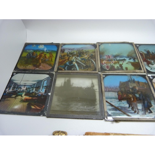 943 - Photographic slides, two silver medallions, military badges, etc.