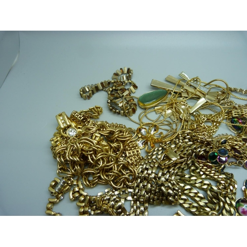 947 - A collection of gold tone jewellery