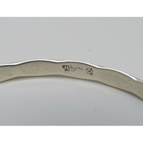 972 - A Charles Horner sterling silver child's size bangle, 50mm