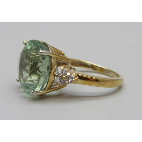 993 - A silver gilt, mint green fluorite and zircon ring, O