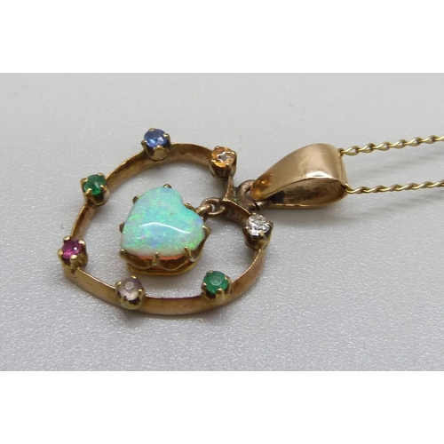 996 - A heart shaped Dearest pendant also set with an opal, on a yellow metal chain, total weight 3.3g