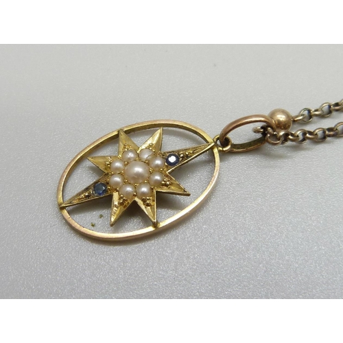 999 - An antique yellow metal, sapphire and pearl pendant on a chain