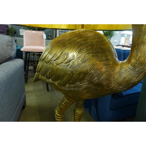 1306 - A large floor standing gold flamingo lamp with green velvet shade