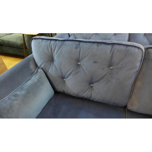 1307 - A Hoxton blue velvet three seater sofa