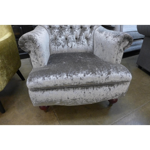 1330 - A mink velvet buttoned armchair