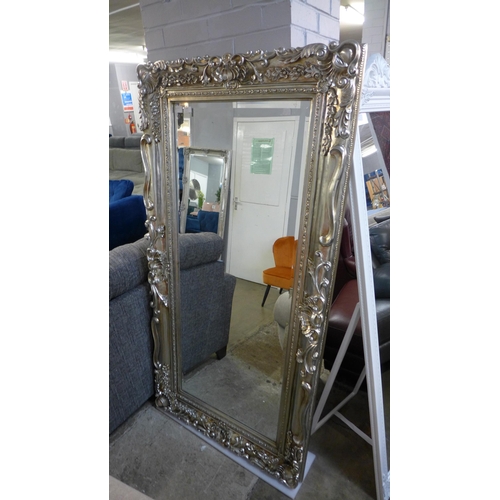 1389 - A large ornate framed mirror