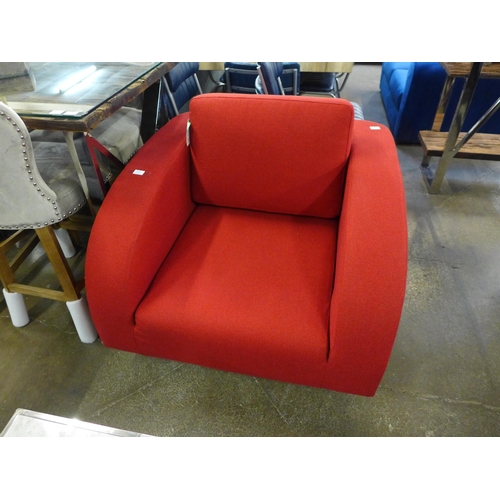 1413 - A red upholstered armchair