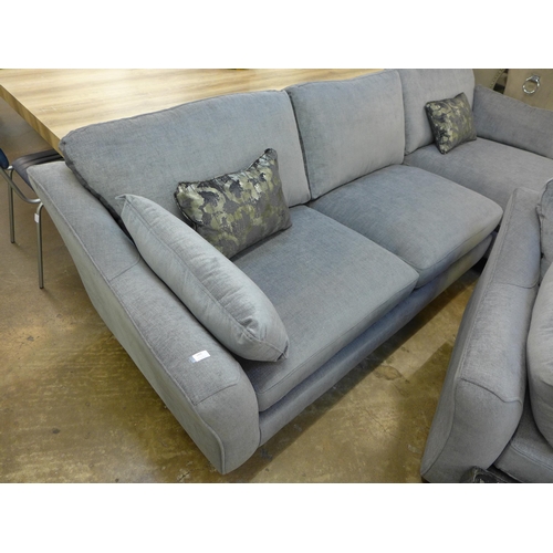 1425 - A pewter upholstered 'L' shaped sofa, love seat and contrasting footstool