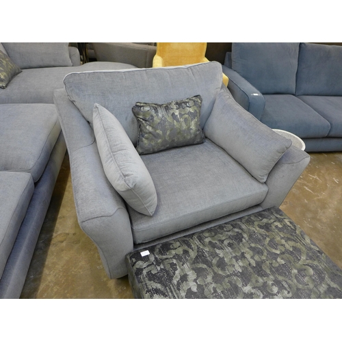 1425 - A pewter upholstered 'L' shaped sofa, love seat and contrasting footstool