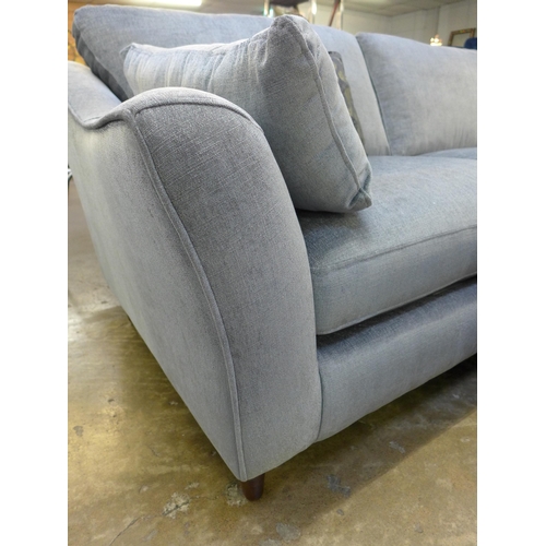 1425 - A pewter upholstered 'L' shaped sofa, love seat and contrasting footstool