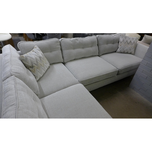 1449 - An oatmeal upholstered corner sofa