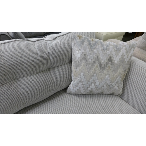 1449 - An oatmeal upholstered corner sofa