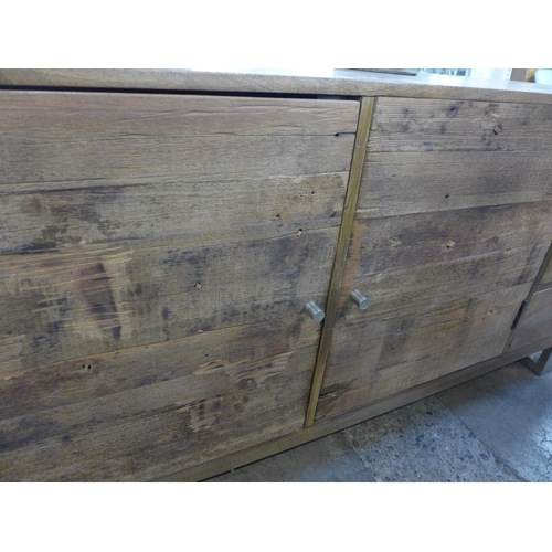 1457 - A railway sleeper three door sideboard