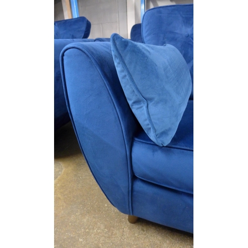 1490 - A Hoxton blue velvet two seater sofa and footstool