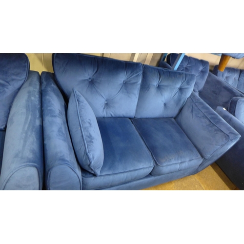 1491 - A Hoxton blue velvet three seater, two seater and armchair