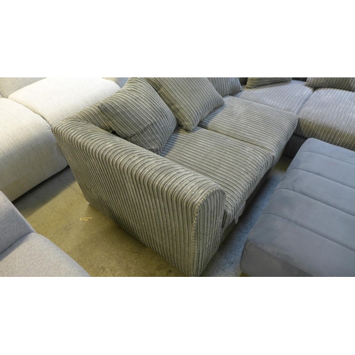 1530 - A grey upholstered jumbo cord corner sofa