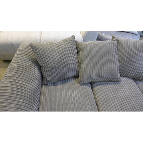 1530 - A grey upholstered jumbo cord corner sofa