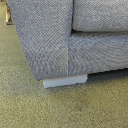 1532 - A grey upholstered two seater sofa - damaged