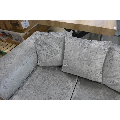 1542 - A silver velvet two seater sofa