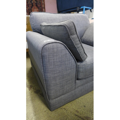 1545 - A grey upholstered armchair - missing feet