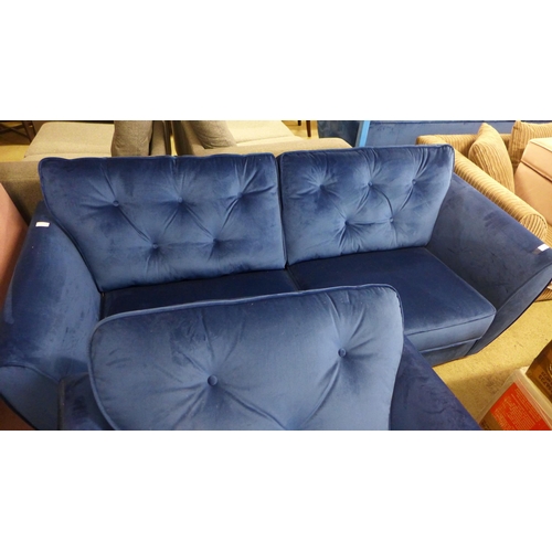 1556 - A Hoxton blue velvet three seater sofa and armchair - damaged legs