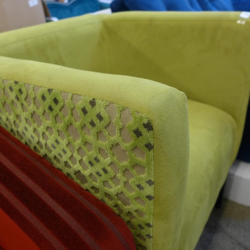 1571 - A lime velvet armchair