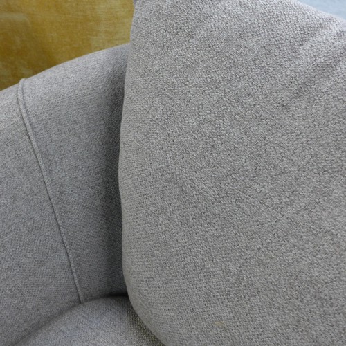 1416 - A grey upholstered swivel armchair