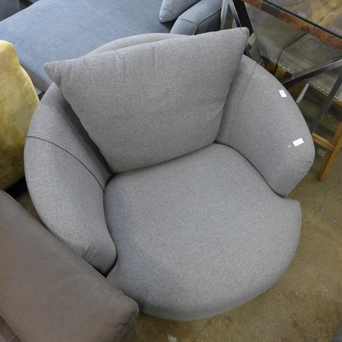 1416 - A grey upholstered swivel armchair