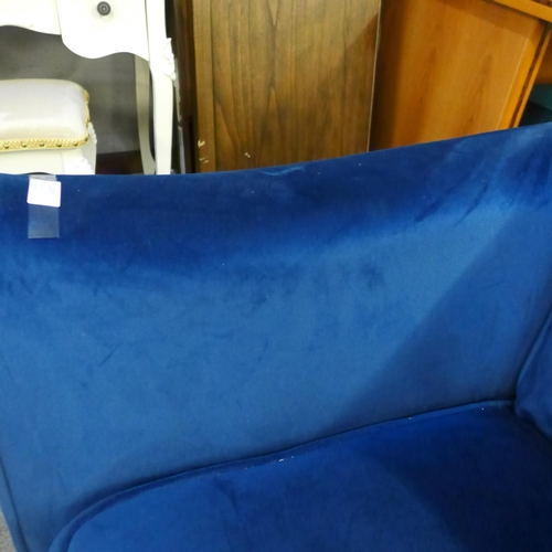 1559 - A Hoxton blue velvet three seater sofa - damaged leg